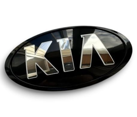 Купить Эмблема Kia OLD TYPE Черная (старый шрифт) 120х60 мм (обод Черный) Пластикна скотче (Завод) 88620 Эмблемы на иномарки
