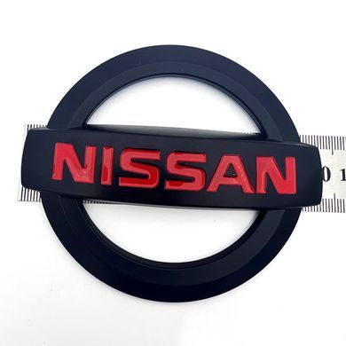 Купити Емблема решітки задня для Nissan матова Чорна 100х85 мм Пластикна скотче (Завод) 88379 Емблеми на іномарки