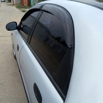 Купити Дефлектори вікон вітровики для Daewoo Lanos 1998- Широкі 4 шт (Auto Clover) 89761 Дефлектори вікон Daewoo
