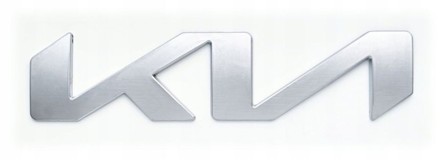 Купить Эмблема надпись Kia NEW СЕРАЯ 130х30 мм металл на скотче (Завод) 88583 Эмблема надпись на иномарки