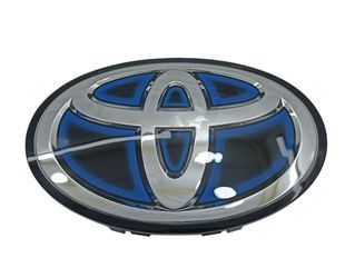 Купити Емблема під склом Toyota Чорна із Синім Контуром 190х130 мм (на кліпсах) (Завод) 88929 Емблеми на іномарки