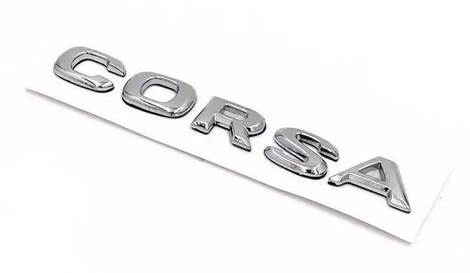 Купить Эмблема надпись CORSA Хром 145х21 мм для Opel Пластикна скотче (Завод) 88592 Эмблема надпись на иномарки