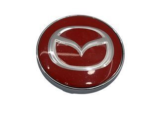 Купить Колпак колеса Mazda красный 60 мм пластик металл 1 шт (колпачок, заглушка диска) 94661 Колпачки на титаны