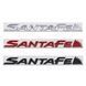 Купити Емблема напис SantaFe для Hyundai Чорна 25х240 мм метал на скотчі (Завод) 89546 Емблема напис на іномарки - 3 фото из 3