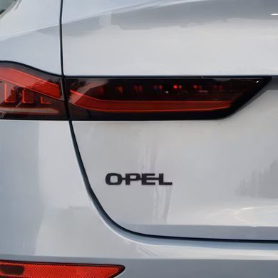 Купить Эмблема надпись Opel Опель 95х16 мм Черная (Завод) 88947 Эмблема надпись на иномарки