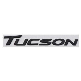 Купить Эмблема надпись TUCSON для Hyundai Черная 32х217 мм металл на скотче (Завод) 89548 Эмблема надпись на иномарки