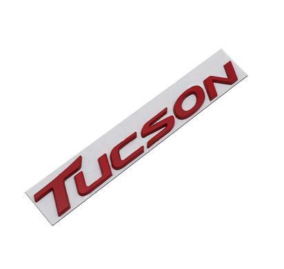 Купить Эмблема надпись TUCSON для Hyundai Красная 32х217 мм металл на скотче (Завод) 89549 Эмблема надпись на иномарки