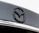 Купити Емблема Mazda 105&times;84мм Чорна пластик (на скотчі) (вир-во Завод) CH 90367 Емблеми на іномарки - 3 фото из 3